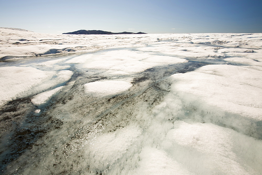 Melt water on the Greenland ice sheet which is melting at an unprecedented rate due to human-induced climate change, near Camp Victor north of Ilulissat, Greenland, Polar Regions