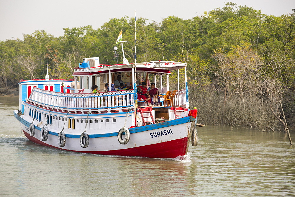 Boats carrying people and goods in the Sunderbans, a low lying area of the Ganges Delta in Eastern India, that is very vulnerable to sea level rise.