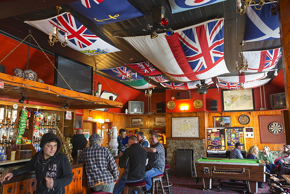 Drinkers in the Globa Tavern in Port Stanley, the capital of the Falkland Islands.