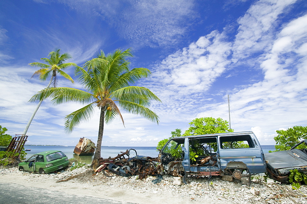 A ship, car and van wrecked by Hurricane Bepe on Funafuti Atoll, Tuvalu, Pacific