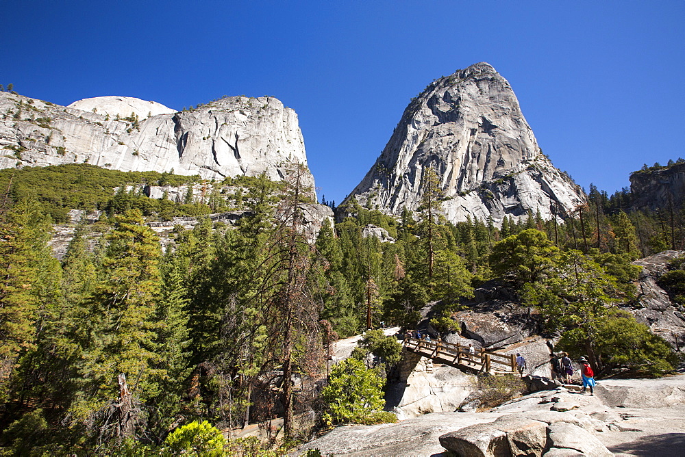 A mountain trail and bridge above the Nevada Fall in the Little Yosemite Valley, Yosemite National Park, California, USA.