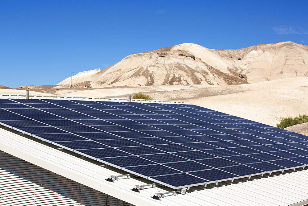 Solar panels amongst Badland scenery in Death Valley which is the lowest, hottest, driest place in the USA, with an average annual rainfall of around 2 inches, some years it does not receive any rain at all.