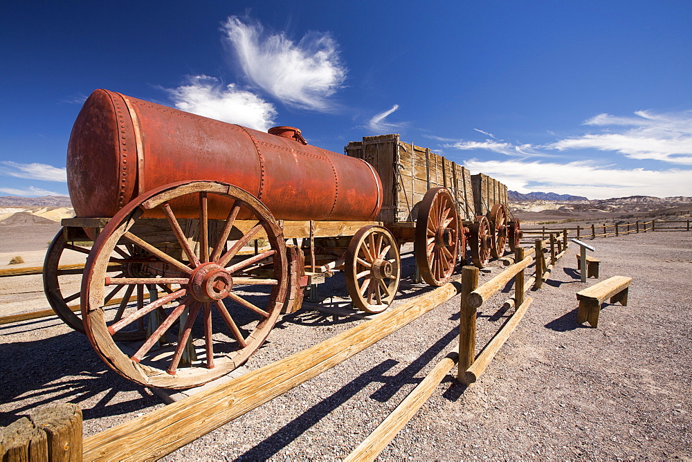 An old wagon train at the Harmony Borax works in Death Valley which is the lowest, hottest, driest place in the USA, with an average annual rainfall of around 2 inches, some years it does not receive any rain at all.