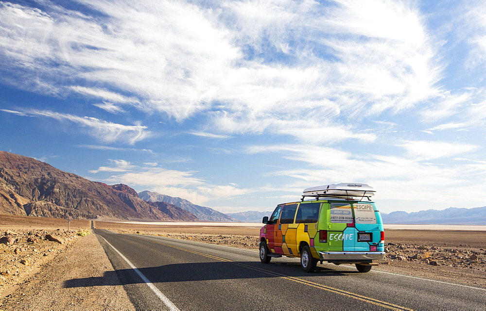 An RV on the road near Badwater which is the lowest point in the USA being 282 feet below sea level in Death Valley. Death Valley is the lowest, hottest, driest place in the USA, with an average annual rainfall of around 2 inches, some years it does not receive any rain at all.