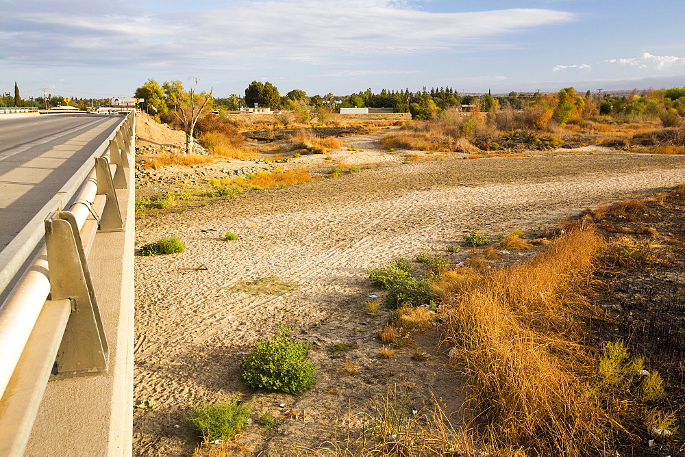 The dried up river bed of the Kern River in Bakersfield, California, USA. Following an unprecedented four year long drought, Bakersfield is now the driest city in the USA.