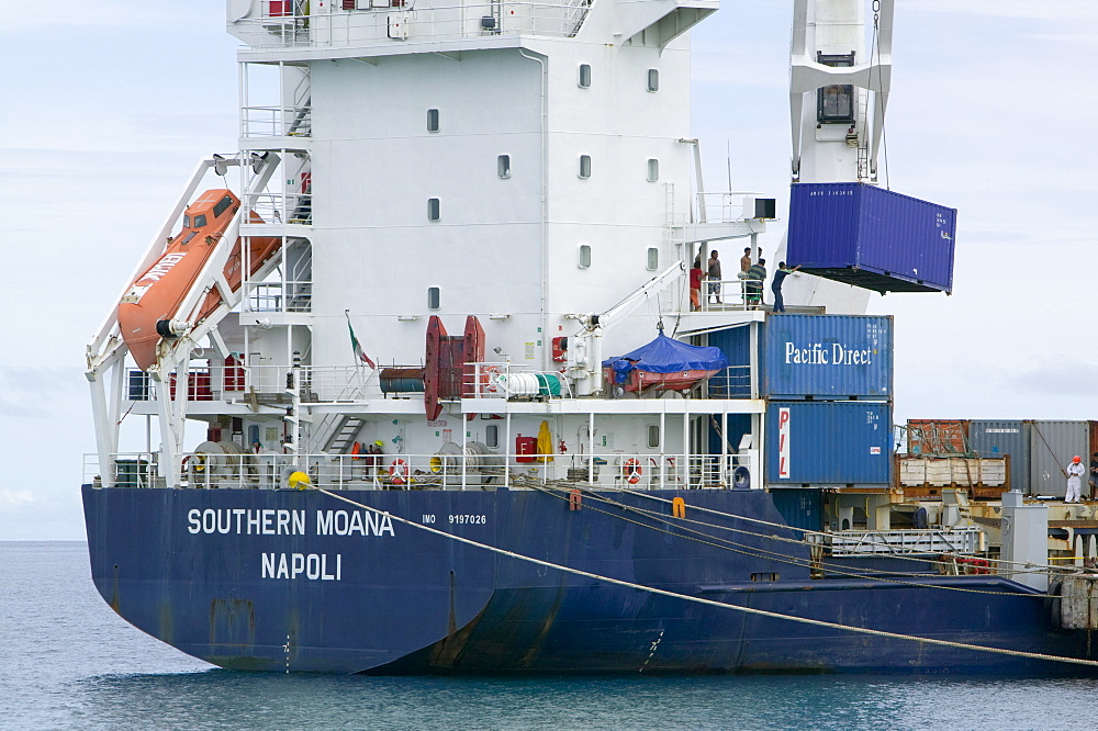 Tuvaluan workers loading containers on the supply ship for Funafuti Atoll, Tuvalu, Pacific