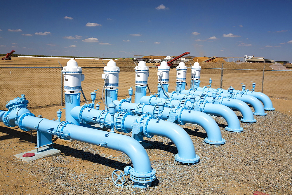 Irrigation pipes near Wasco in the Central Valley of California following the four year long drought in the Western USA. Many farms have run out of water, and $2.2 Billion has been wiped off the agricultue sector annually. Currently one third of all children in California go to be hungry, as a direct result of job losses connected to the drought. 428,000 acres of farmland have been taken out of production as a result of the drought, in the Central Valley.