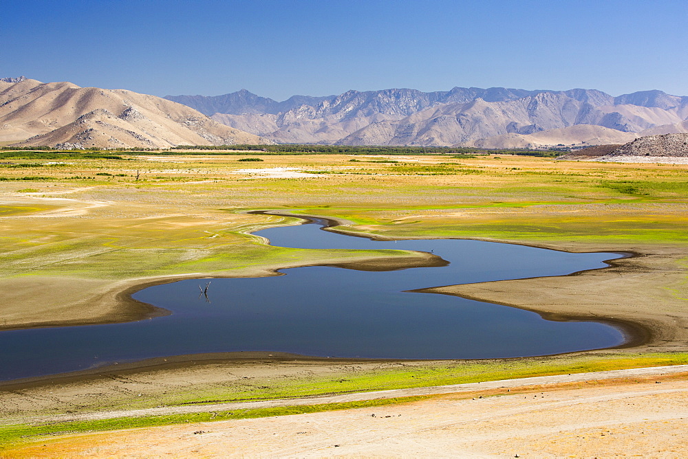 Lake Isabella near Bakersfield, East of California's Central valley is at less than 13% capacity following the four year long devastating drought. The reservoir has dropped so low, that the water level is below the outflow pipe.