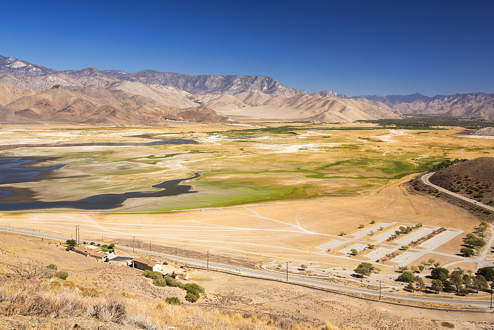 Lake Isabella near Bakersfield, East of California's Central valley is at less than 13% capacity following the four year long devastating drought. The reservoir has dropped so low, that the water level is below the outflow pipe.