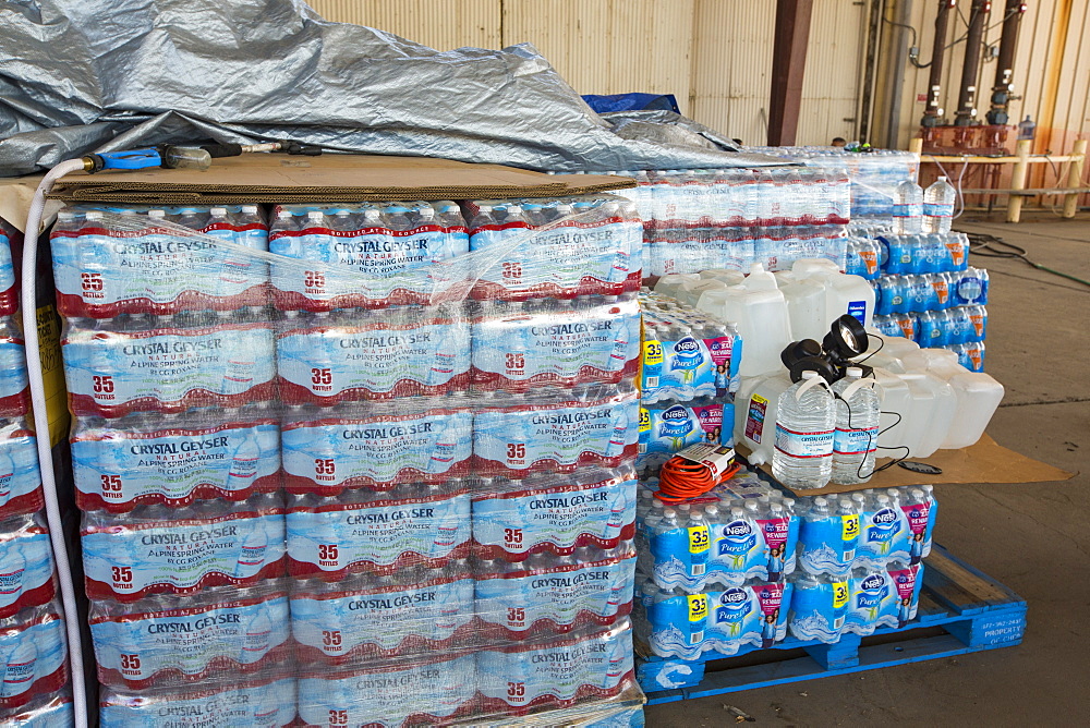 A water charity in Porterville supplying bottled water to houses who have had no running water for over five months, near Bakersfield, California, USA. Hoses in the East of Porterville, many of which are on private wells, have run completely out of water as the water table has dropped catastrophically. Following an unprecedented four year long drought, Bakersfield is now the driest city in the USA. Most of California is in exceptional drought, the highest level of drought classification. 428,000 acres of agricultural land have been taken out of production due to lack of water, thousands of agricultural workers have lost their jobs and one third of all children in California go to bed hungry.