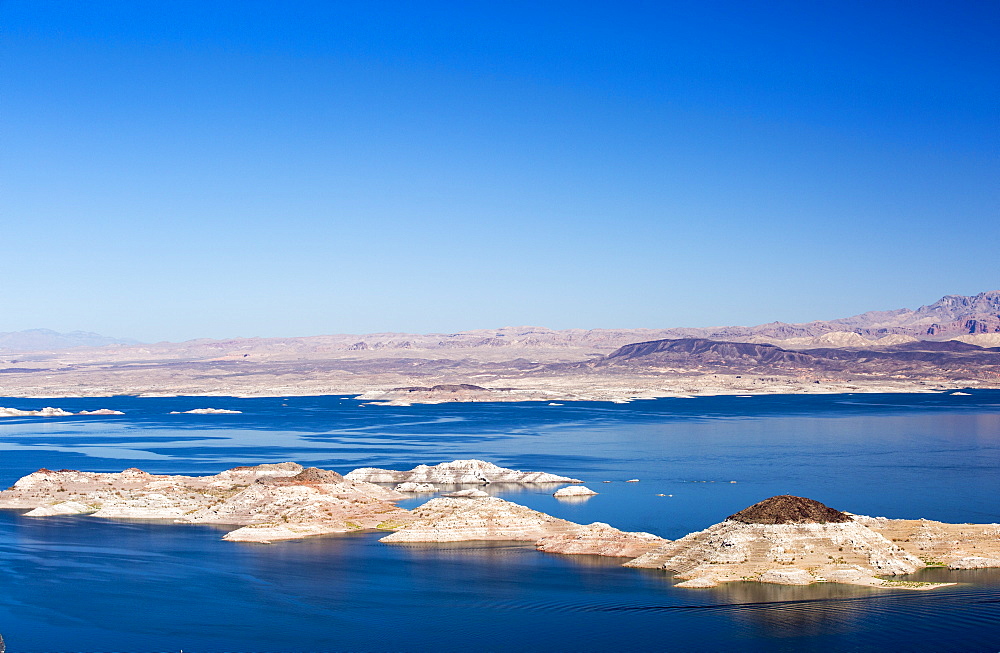 Lake Mead, Nevada, USA. The lake is at a very low level due to the four year long drought, with the boundary of where the water used to reach, clearly visible.