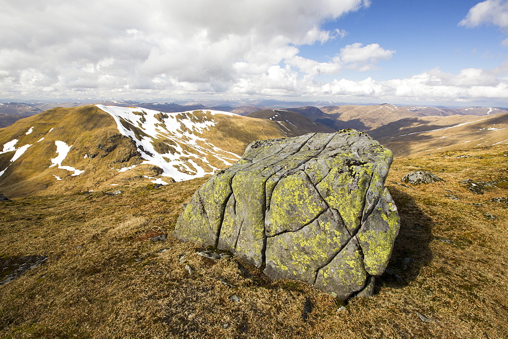 A lichen covered boulder on Beinn Ghlas, a Munro on the side of Ben Lawers.