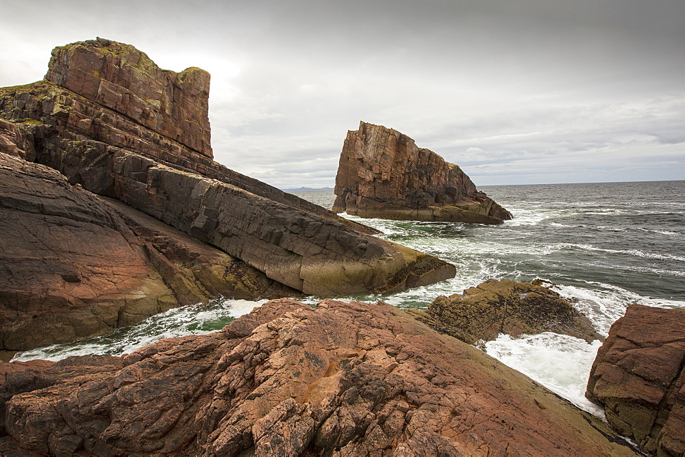 The famous split rock of Clachtoll in Clachtoll, Assynt, Noth West Highlands, Scotland, UK.