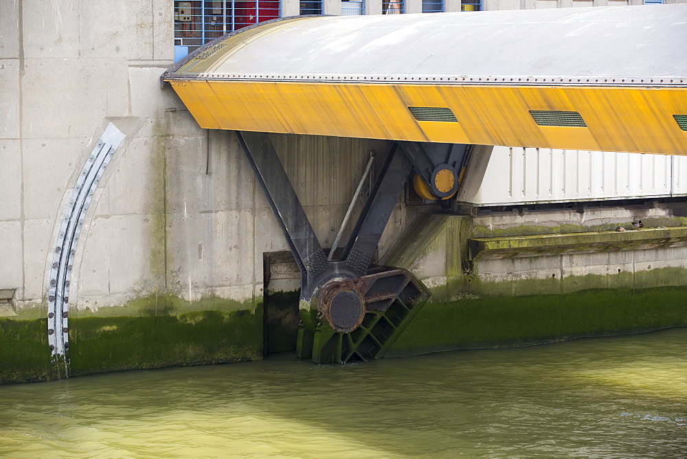 The Thames barrier on the River Thames in London. It was constructed to protect the capital city from storm surge flooding. Recent predictions show it will probably be redundant in around twenty years due to increased stormy weather and sea level rise driven by climate change.