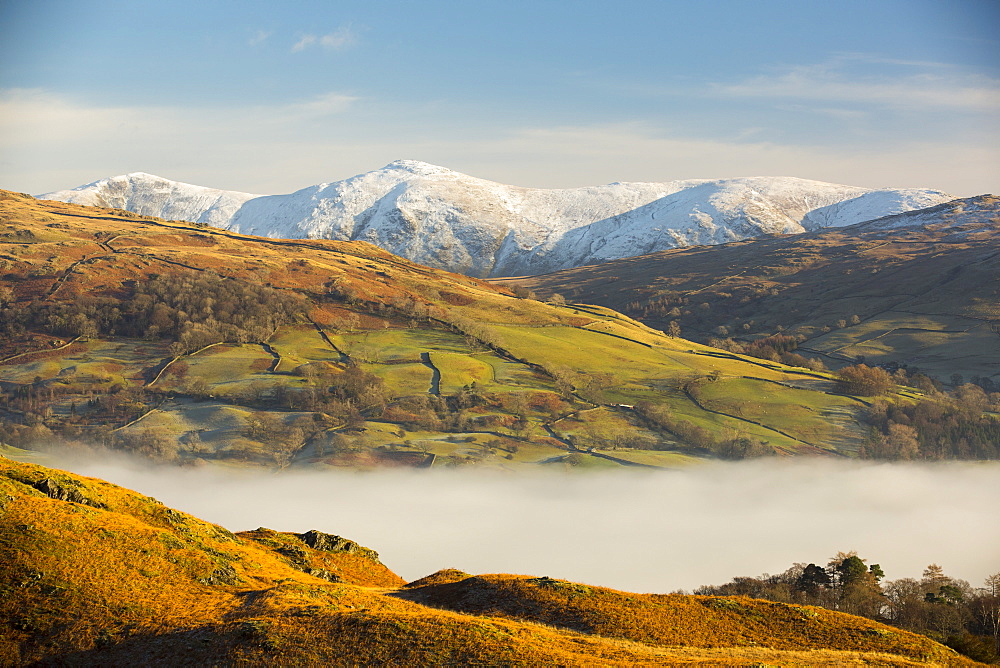 Looking towards the Kentmere fells from Loughrigg above valley mist from a temperature inversion, Lake District, UK.