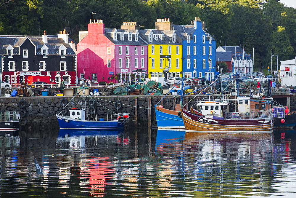 The iconic promenade of Tobermory on the Isle of Mull, Scotland, UK, with its colouful painted shops.