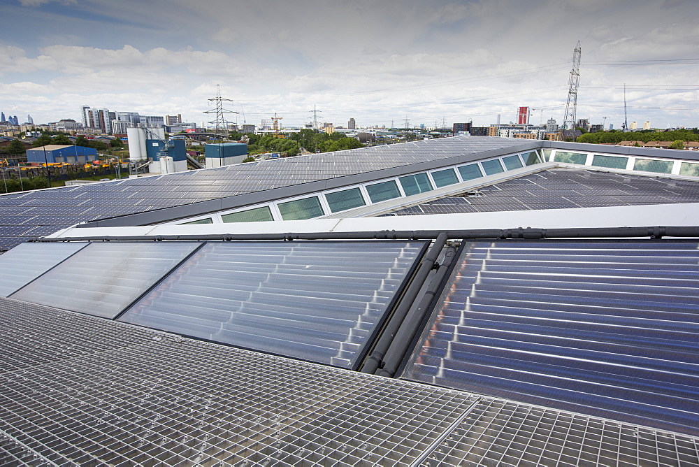 Solar thermal and solar PV panels on the roof of the Crystal building which is the first building in the world to be awarded an outstanding BREEAM (BRE Environmental Assessment Method) rating and a LEED (Leadership in Energy and Environmental Design) platinum rating. London, UK.