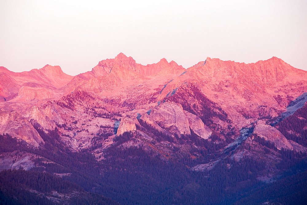 A Mountain chain view from the summit of Moro Rock a granite outcrop viewpoint in the Sequoia National Park, Yosemite, USA, at sunset.