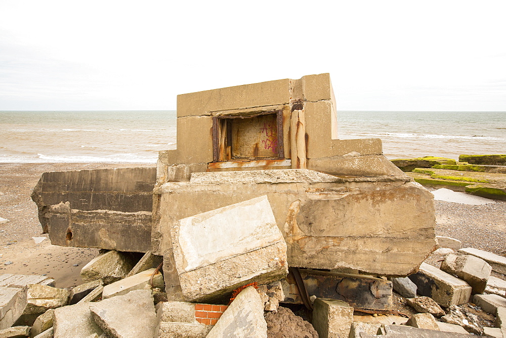 The Remains of the Godwin battery on the beach at Kilnsea at the head of Spurn point on Yorkshires East Coast, UK. Initially constructed during the First World War, the Godwin Battery was added to during the Second World War. It comprised of gun emplacements, search light, barracks, officers‚Äô mess, and a hospital. This section of coastline is the fastest eroding coastline in Europe. The soft boulder clay cliffs are easily eroded and have been eroding since Roman Times, but recently the climate change impacts of increased stormy weather, increased heavy rainfall events and sea level rise have accelerated the rate of erosion. The average rate of attrition is 1.5metres per year, last year it was 5 metres.