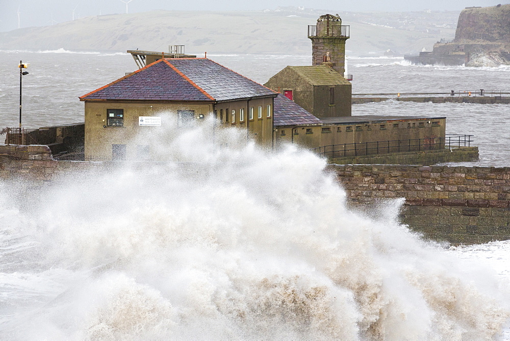 Whitehaven harbour during the January 2014 period of storm surge, high tides and storm force winds. The coastline took a battering, damaging the harbour wall and eroding a large section of coastal cliff.