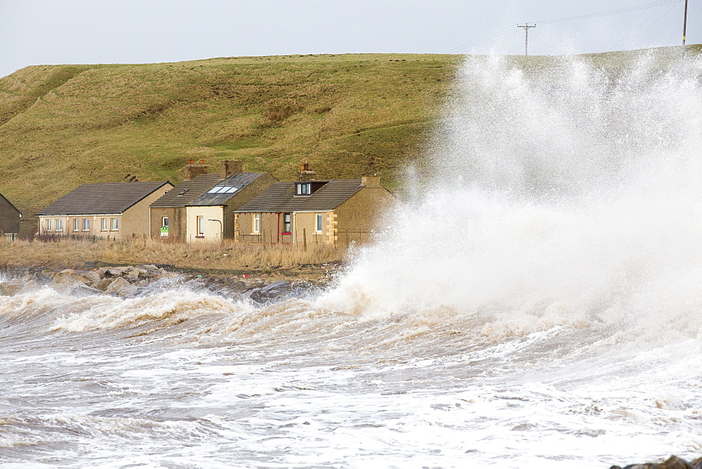 Waves crashing off Parton near Whitehaven during the January 2014 period of storm surge, high tides and storm force winds. The coastline took a battering, damaging the harbour wall and eroding a large section of coastal cliff.