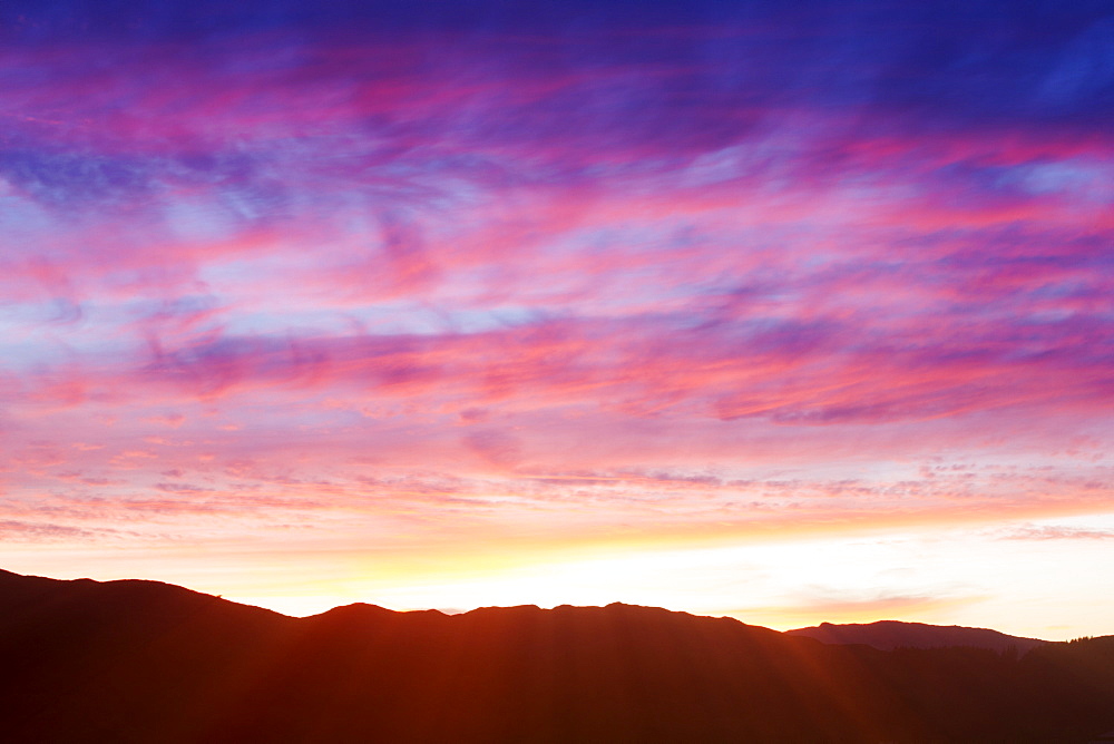 Sunset over Loughrigg from Ambleside in the Lake District National Park, Cumbria, UK.