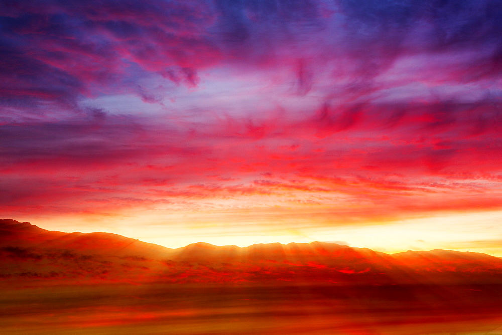 Sunset over Loughrigg from Ambleside in the Lake District National Park, Cumbria, UK.