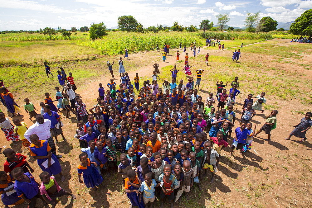 In mid January 2015, a three day period of excessive rain brought unprecedented floods to the small poor African country of Malawi. It displaced nearly quarter of a million people, devastated 64,000 hectares of land, and killed several hundred people. This shot shows displaced children in Baani refugee camp near Phalombe.