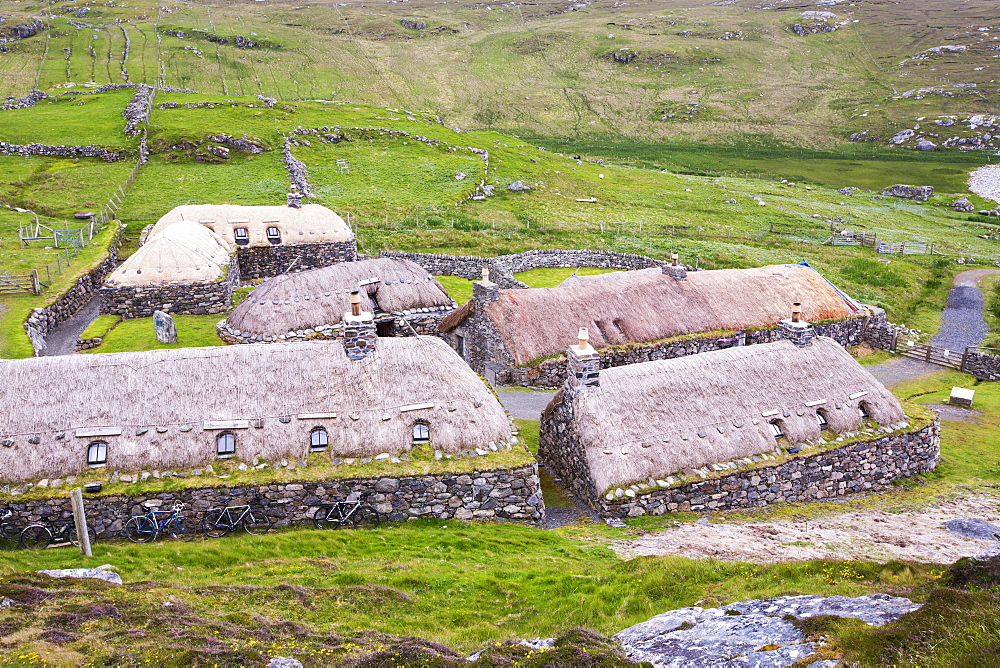 The Black House village at Garenin near Carloway on the Isle of Lewis, Outer Hebrides, Scotland, UK. These ancient traditional houses have been preserved, after they were abandoned finally in the 1970's until then people were living in them.