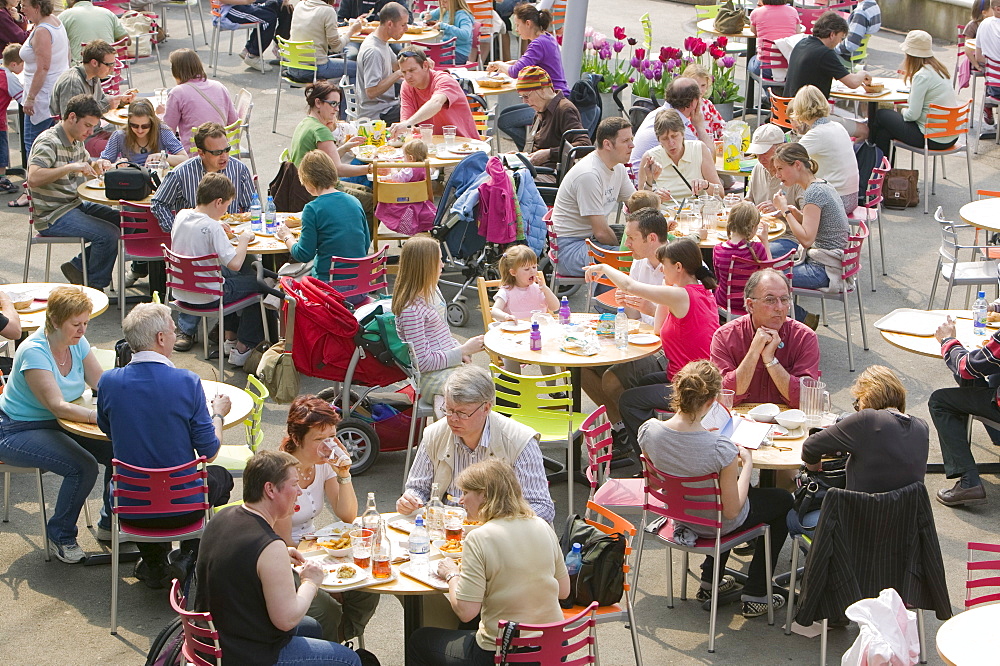 Tourists at a cafe at the Eden Project, Cornwall, England, United Kingdom, Europe