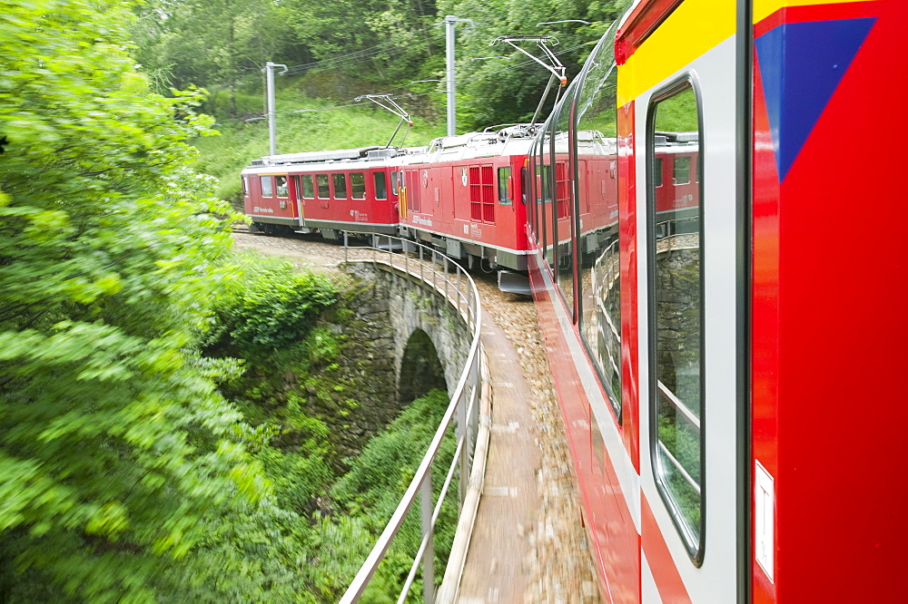 The Bernina Glacier express that goes from Chur in Switzerland to Tirano in Italy, Europe