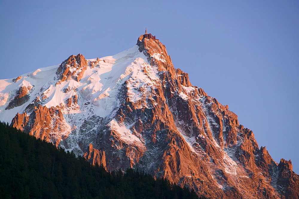 The Aiguille du Midi at sunset above Chamonix, Haute Savoie, France, Europe