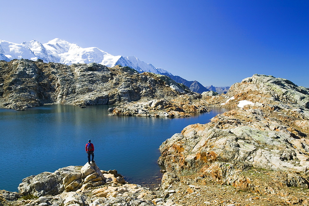 Walkers at Lac Noir in the Aiguille Rouge National Park near Chamonix, Haute Savoie, France, Europe