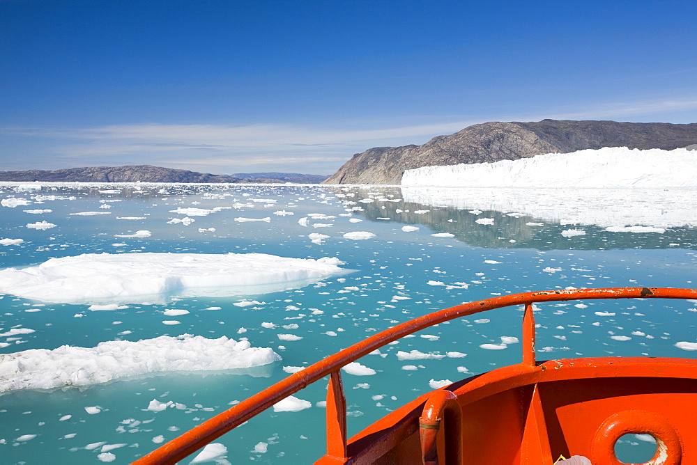 A boat at Camp Victor by the Eqip Sermia glacier that is receeding rapidly due to global warming on the west coast of Greenland, Polar Regions