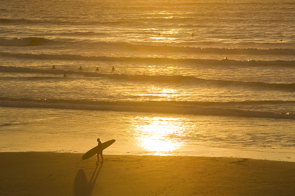 Surfers at Hayle Bay, Polzeath, Cornwall, England, United Kingdom, Europe