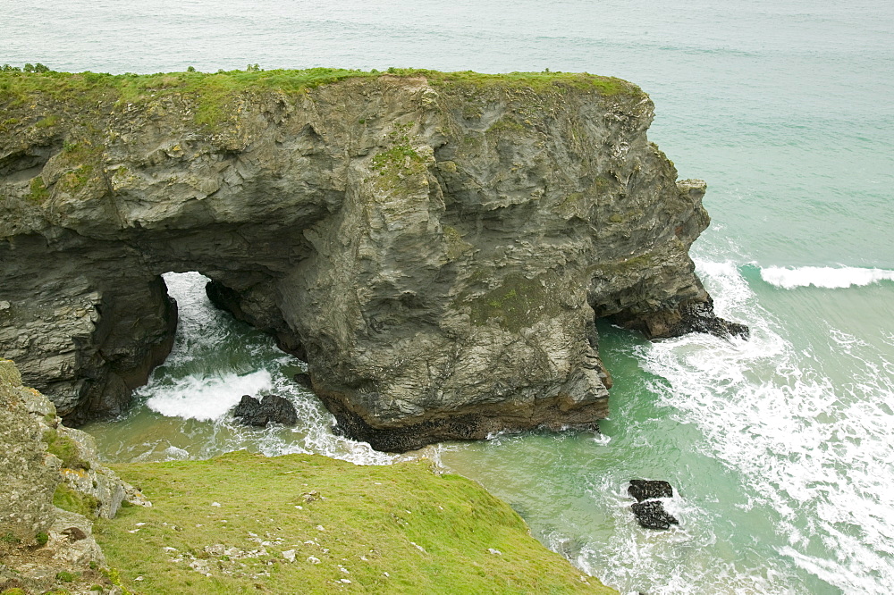 A sea arch at Bedruthan Steps in Cornwall, England, United Kingdom, Europe