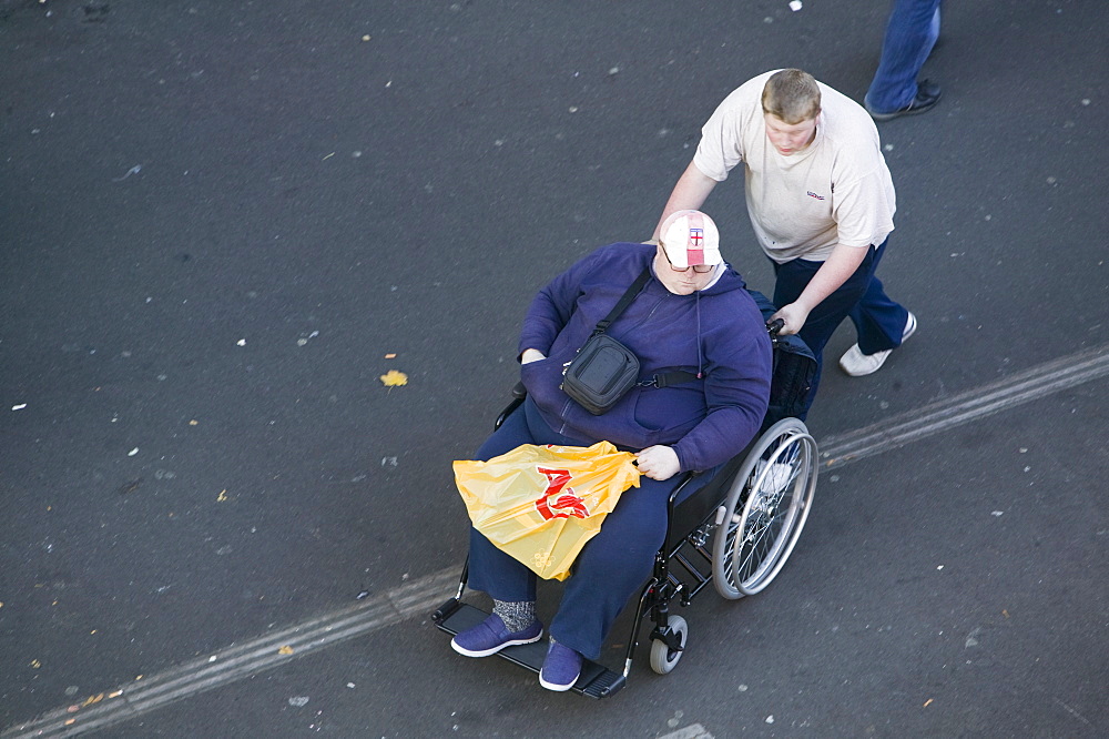 An obese disabled man in Leicester, Leicestershire, England, United Kingdom, Europe