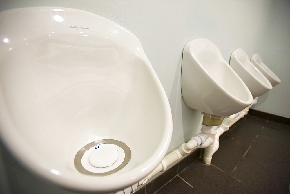 Water free urinals in a gents toilet for saving water