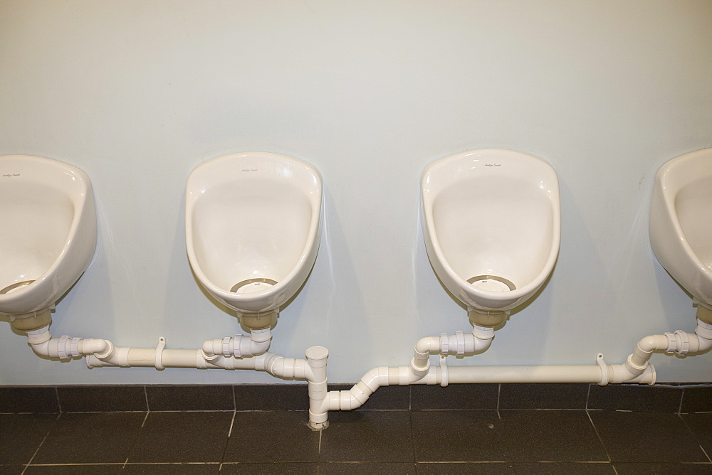 Water free urinals in a gents toilet for saving water