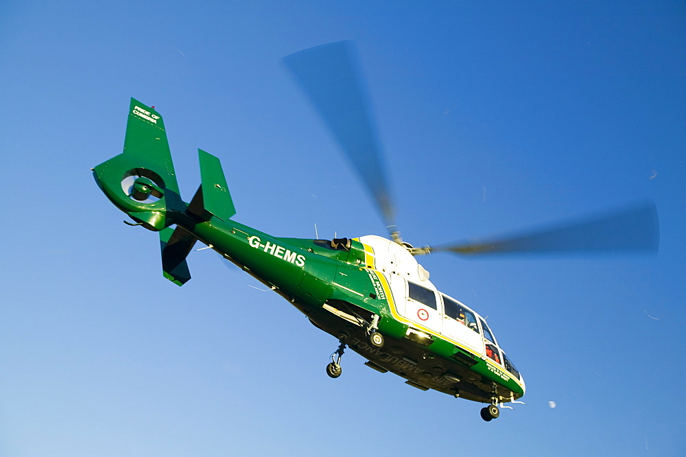 An air ambulance attending a mountain rescue in the Lake District, Cumbria, England, United Kingdom, Europe