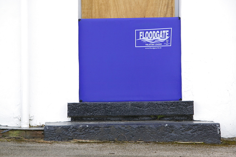 A flood protection device on a house to protect from flooding caused by high spring tides and gale force winds, Sandside, near Arnside, Cumbria, England, United Kingdom, Europe