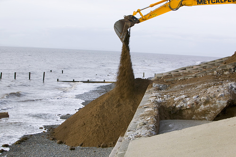 Repairing damage to the road between Allonby and Silloth caused by floods in 2008, Cumbria, England, United Kingdom, Europe