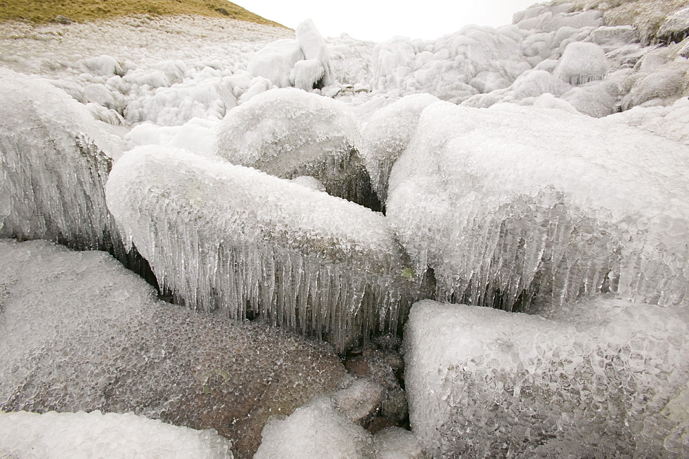 Gale force winds in 2008 blew water from a waterfall in Stake Pass back up the hill coating the surrounding area in thick ice, Lake District, Cumbria, England, United Kingdom, Europe