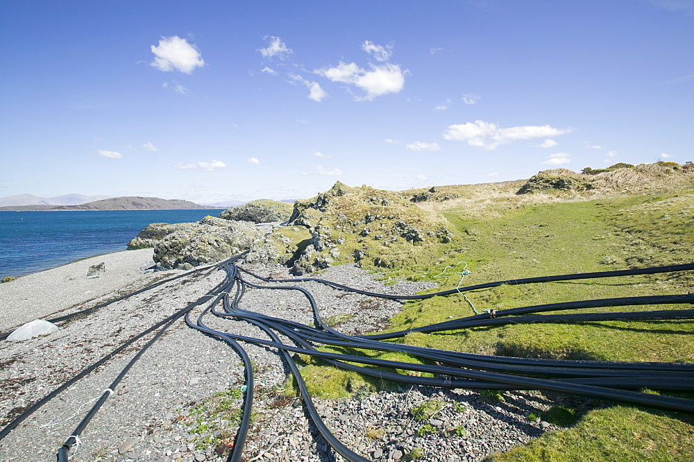 Plastic pipes dumped on a beach near Oban, Scotland, United Kingdom, Europe