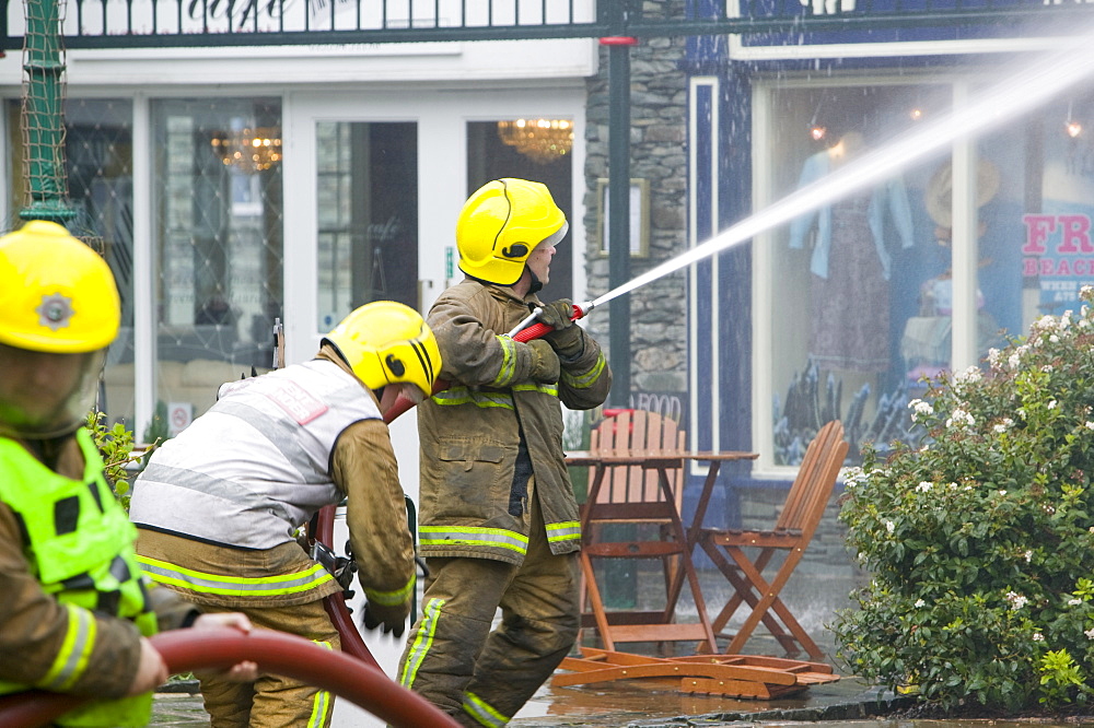 A fire being tackled by firemen in Ambleside, Lake Distruct, Cumbria, England, United Kingdom, Europe