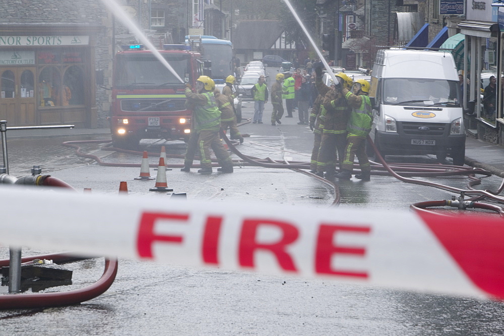 A fire being tackled by firemen in Ambleside, Lake Distruct, Cumbria, England, United Kingdom, Europe