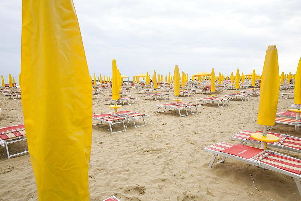 Umbrellas and recliners on the beach at Lido de Jesolo in the Venice Lagoon, Veneto, Italy, Europe