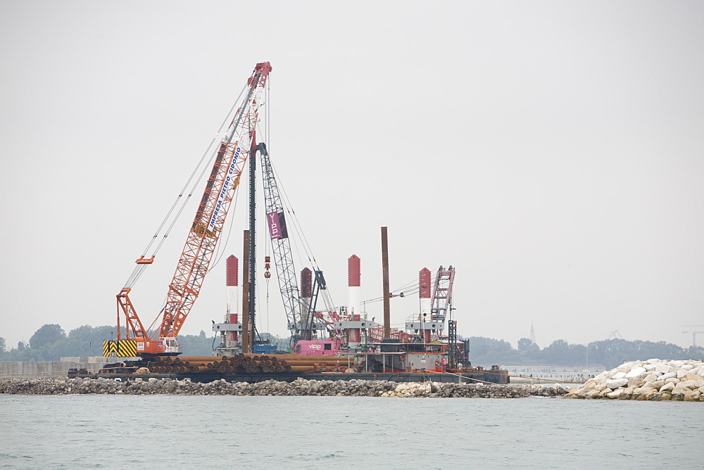 Engineering works, part of the MOSE project to protect Venice by building barricades to rise from the lagoon, in the battle against climate change, Venice, Veneto, Italy, Europe