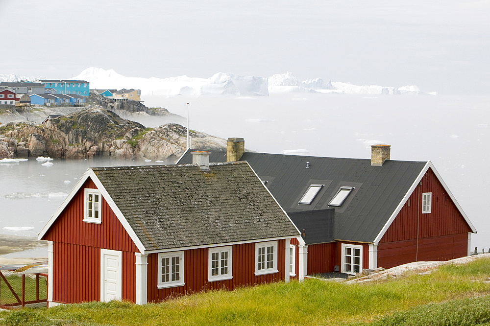 Mist over icebergs in Ilulissat, UNESCO World Heritage Site, on Greenland, Polar Regions