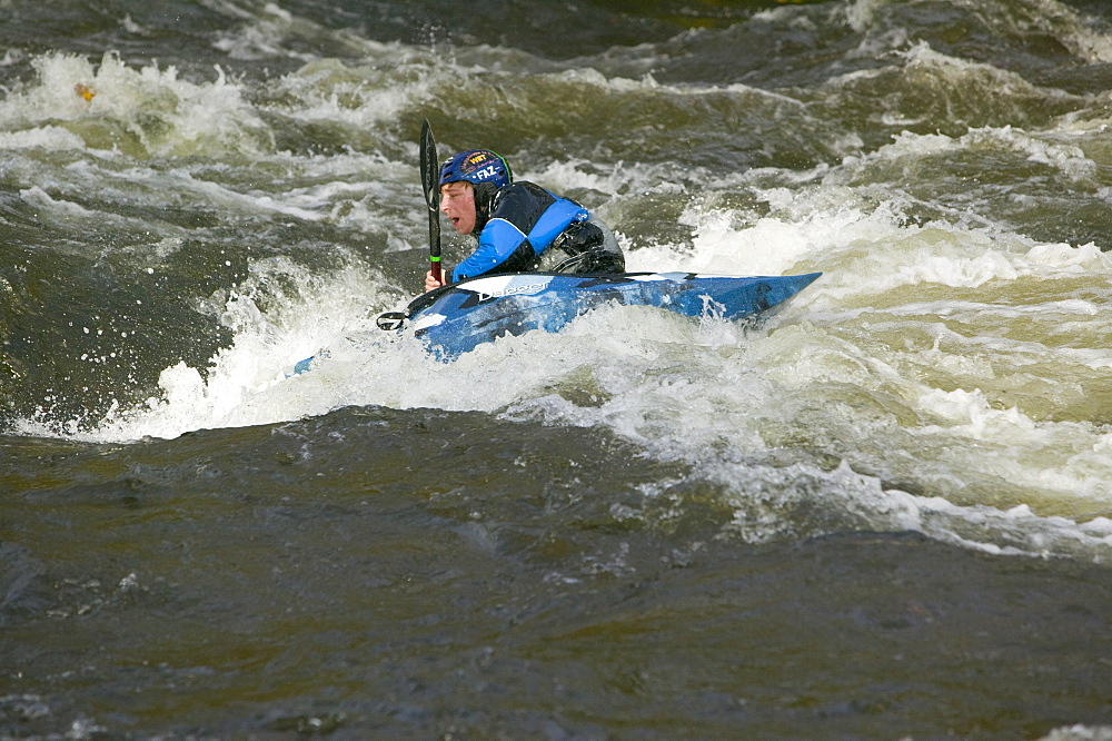 Canoeist on the River Brathay near Ambleside, Lake District, Cumbria, England, United Kingdom, Europe